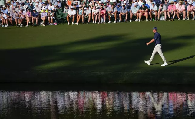 Bryson DeChambeau walks to the green on the 16th hole during final round at the Masters golf tournament at Augusta National Golf Club Sunday, April 14, 2024, in Augusta, Ga. (AP Photo/Matt Slocum)