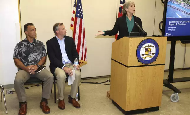 Hawaii Attorney General Anne Lopez, right, introduces Fire Safety Research Institute (FSRI) members Derek Alkonis, left, and Steve Kerber during a press conference on the Maui Wildfire Phase One Report findings on Wed, April 17, 2024, in Honolulu. (AP Photo/Marco Garcia)