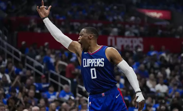 LA Clippers guard Russell Westbrook (0) reacts after Dallas Mavericks forward P.J. Washington failed to make a penalty shot during the first half of Game 1 of an NBA basketball first-round playoff series in Los Angeles, Sunday, April 21, 2024. (AP Photo/Ashley Landis)