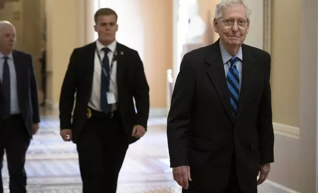 Minority Leader Sen. Mitch McConnell walks to the Senate Chambers before House Impeachment managers deliver the Secretary Mayorkas Impeachment Articles to the Senate on Monday, April 15, 2024, in Washington. (AP Photo/Kevin Wolf)