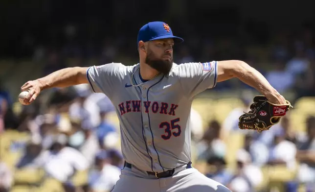 New York Mets pitcher Adrian Houser (35) delivers during the first inning of a baseball game against the Los Angeles Dodgers in Los Angeles, Sunday, April 21, 2024. (AP Photo/Kyusung Gong)