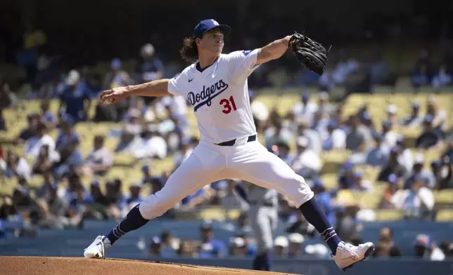 Los Angeles Dodgers pitcher Tyler Glasnow delivers during the first inning of a baseball game against the New York Mets in Los Angeles, Sunday, April 21, 2024. (AP Photo/Kyusung Gong)