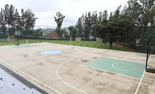 A basketball court with a volleyball play ground at Hope Hostel, where U.K. asylum seekers from the U.K. are expected to arrive in the next 10-12 weeks in Kigali, Rwanda, Wednesday, April 24, 2024. The management of the hostel where the migrants are to stay in, Hope Hostel, says the facility is ready to accommodate 100 migrants. (AP Photo/Atulinda Allan)