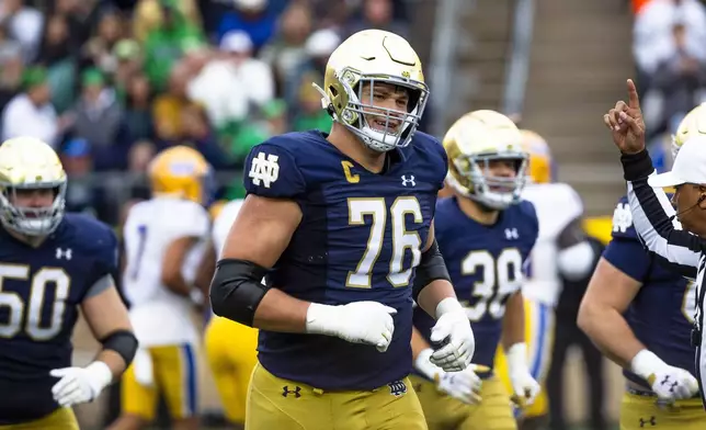 FILE - Notre Dame offensive lineman Joe Alt (76) during the second half of an NCAA college football game against Pittsburgh Saturday, Oct. 28, 2023, in South Bend, Ind. Alt is a possible first round pick in the NFL Draft. (AP Photo/Michael Caterina, File)