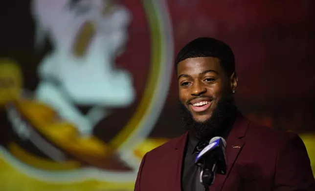 FILE - Florida State defensive lineman Jared Verse speaks during the Atlantic Coast Conference NCAA college football media days Wednesday, July 26, 2023, in Charlotte, N.C. Verse is a possible first round pick in the NFL Draft. (AP Photo/Erik Verduzco, File)