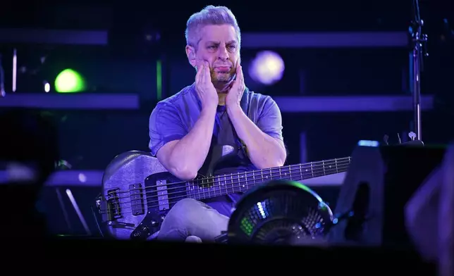 Mike Gordon, bassist for the band Phish warms up before rehearsing for the group's four night engagement at the Sphere on Tuesday, April 16, 2024, in Las Vegas. (AP Photo/David Becker)