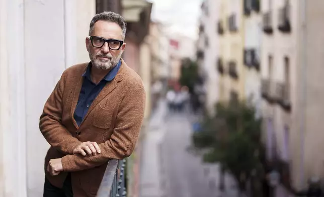 Uruguayan singer Jorge Drexler poses during an interview with The Associated Press in Madrid, Spain, Wednesday, April 3, 2024. (AP Photo/Manu Fernandez)