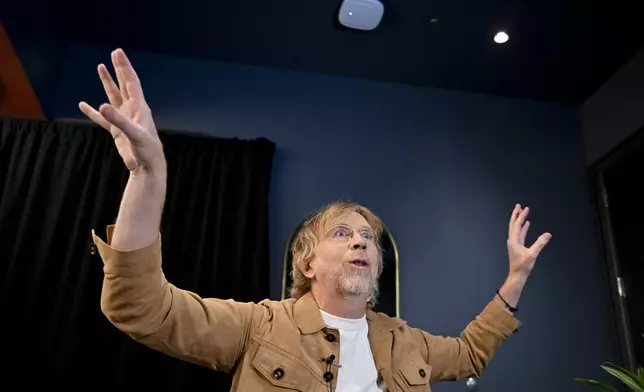 Trey Anastasio, guitarist and singer-songwriter of the band Phish, gestures during an interview on Tuesday, April 16, 2024, in Las Vegas. (AP Photo/David Becker)