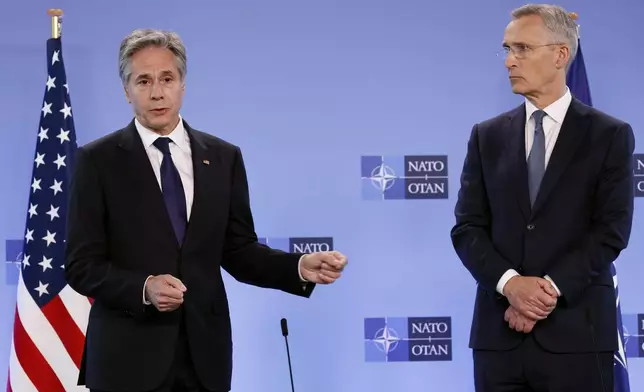 FILE - United States Secretary of State Antony Blinken, left, and NATO Secretary General Jens Stoltenberg address the media during a meeting of NATO foreign ministers at NATO headquarters in Brussels, Wednesday, April 3, 2024. NATO is set to celebrate on Thursday, April 4, 2024, 75 years of collective defense across Europe and North America as Russia's war on Ukraine enters its third year. (AP Photo/Geert Vanden Wijngaert, File)
