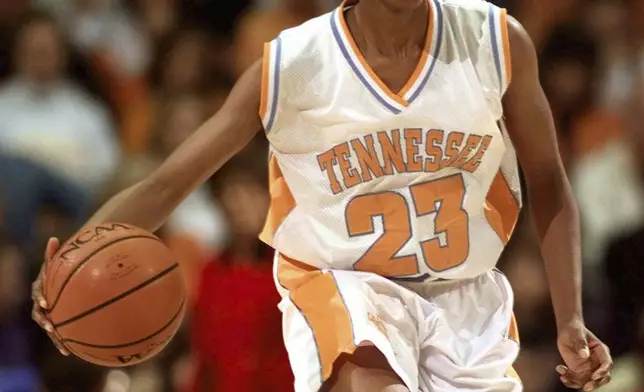 FILE - Tennessee's Chamique Holdsclaw is shown during their victory over Rutgers in the NCAA Mideast Regional Tournament on Saturday, March 21, 1998 in Nashville, Tenn. After losing to UConn in 1995, Tennessee dominated the sport winning three consecutive titles. The last of them was a 39-0 season where Pat Summitt's squad was led by the “Three Meeks” _ Semeka Randall, Chamique Holdsclaw and Tamika Catchings. (AP Photo/John Bazemore, File)