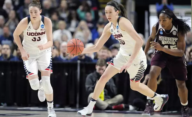 FILE - Connecticut's Katie Lou Samuelson, left, and Breanna Stewart, center, start a fast break in front of Mississippi State's Chinwe Okorie during the first half of an NCAA college basketball game in the regional semifinals of the women's NCAA Tournament, Saturday, March 26, 2016, in Bridgeport, Conn. This was the end of an era for UConn as Stewart capped off her historic career leading the Huskies to a fourth consecutive title and 11th overall. (AP Photo/Jessica Hill, File)