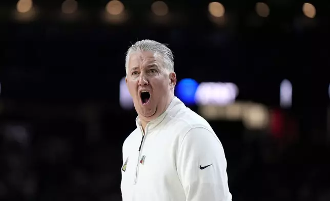 Purdue head coach Matt Painter yells during the first half of the NCAA college Final Four championship basketball game against UConn, Monday, April 8, 2024, in Glendale, Ariz. (AP Photo/Brynn Anderson)