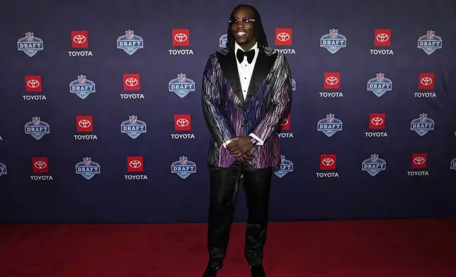 Missouri edge rusher Darius Robinson poses on the red carpet ahead of the first round of the NFL football draft, Thursday, April 25, 2024, in Detroit. (AP Photo/Carlos Osorio)