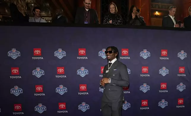 LSU wide receiver Malik Nabers poses on the red carpet ahead of the first round of the NFL football draft, Thursday, April 25, 2024, in Detroit. (AP Photo/Carlos Osorio)