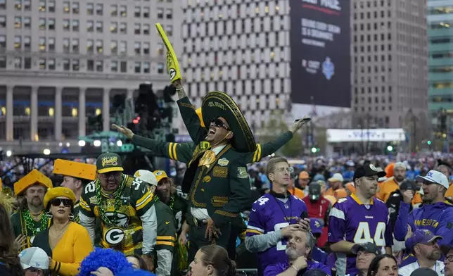 Green Bay Packers fans cheer during the second round of the NFL football draft, Friday, April 26, 2024, in Detroit. (AP Photo/Jeff Roberson)