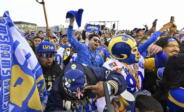 Fans react Thursday, April 25, 2025, in Hermosa Beach, Calif., as the Los Angeles Rams picked Florida State defensive end Jared Verse in the first round of the NFL football draft in Detroit. (Keith Birmingham/The Orange County Register via AP)