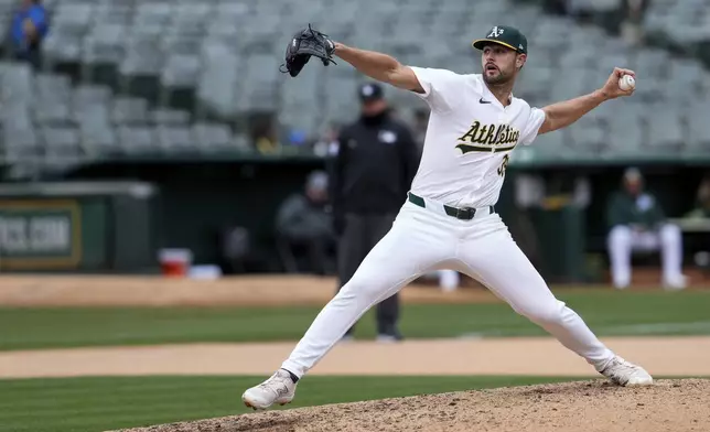 Oakland Athletics' Kyle Muller pitches to a Washington Nationals batter during the seventh inning of a baseball game Saturday, April 13, 2024, in Oakland, Calif. (AP Photo/Godofredo A. Vásquez)