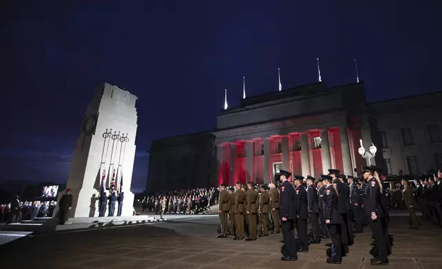 An Anzac Day dawn service is held at the Auckland War Memorial Museum in Auckland, New Zealand, Thursday, April 25, 2024. (Hayden Woodward /NZ Herald via AP)