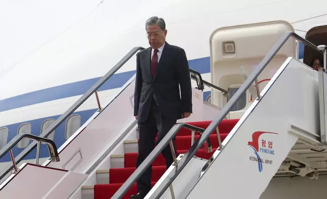 Zhao Leji, chairman of the National People’s Congress of China and considered the No. 3 official in the ruling Communist Party, and other delegates arrive at the Pyongyang International Airport in Pyongyang, North Korea, Thursday, April 11, 2024. (AP Photo/Cha Song Ho)