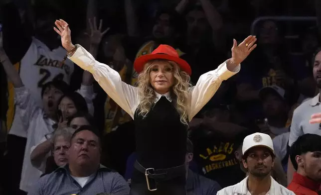 Actress Dyan Cannon cheers during the first half in Game 4 of an NBA basketball first-round playoff series between the Los Angeles Lakers and the Denver Nuggets Saturday, April 27, 2024, in Los Angeles. (AP Photo/Mark J. Terrill)