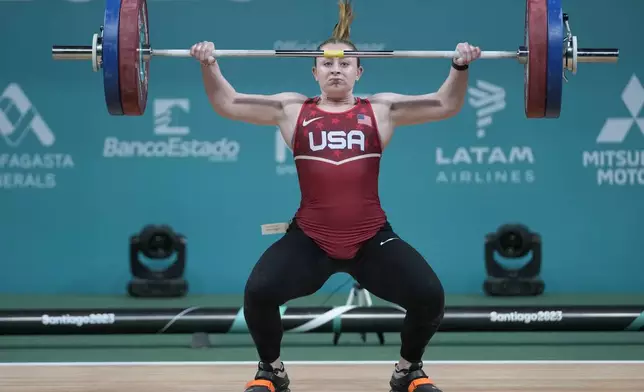 FILE - Olivia Reeves of the United States lifts in the women's 81kg weightlifting event at the Pan American Games in Santiago, Chile, Monday, Oct. 23, 2023. (AP Photo/Moises Castillo, File)