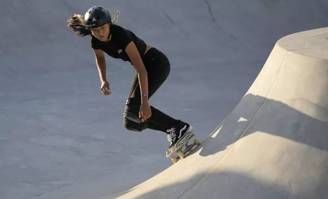 FILE - Kokona Hiraki of Japan competes in the Women's final of the Skateboard Park 2023 World Championships, a qualifying event for the Paris Olympic Games, at Ostia's Skatepark outside Rome, Sunday, Oct. 8, 2023. (AP Photo/Gregorio Borgia, File)