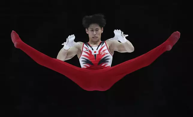 FILE - Japan's Daiki Hashimoto competes on the horizontal bar during the apparatus finals at the Artistic Gymnastics World Championships in Antwerp, Belgium, Sunday, Oct. 8, 2023. (AP Photo/Geert vanden Wijngaert, File)