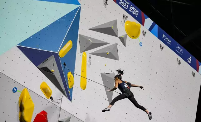 FILE - Natalia Grossman of the United States competes in the women's boulder lead climbing final at the Pan American Games in Santiago, Chile, Tuesday, Oct. 24, 2023. Six new venues were built for 30 sporting events, an investment of $507 million. (AP Photo/Esteban Felix, File)