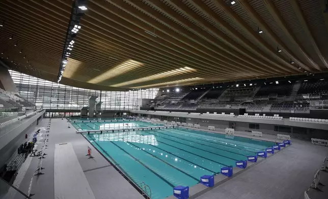 A view of the Olympic Aquatic Center, Wednesday, March 6, 2024 in Saint-Denis, outside Paris. The aquatic center will host the artistic swimming, water polo and diving events during the Paris 2024 Olympic Games. (AP Photo/Christophe Ena, File)
