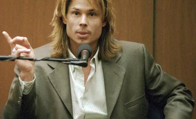FILE - Witness Brian "Kato" Kaelin testifies under direct examination during O.J. Simpson's double-murder trial at the Los Angeles Criminal Courts Building Tuesday, March 21, 1995, in Los Angeles. Simpson, the decorated football superstar and Hollywood actor who was acquitted of charges he killed his former wife and her friend but later found liable in a separate civil trial, has died. He was 76. (John McCoy/Los Angeles Daily News via AP, Pool, File)