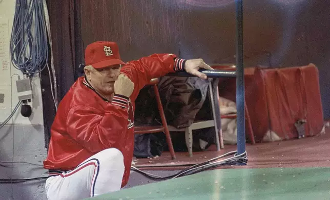 FILE - St. Louis Cardinals manager Whitey Herzog watches during Game 7 of the World Series against the Kansas City Royals in Kansas City, Oct. 27, 1985. The Cardinals lost 11-0. Herzog, the gruff and ingenious Hall of Fame manager who guided the St. Louis Cardinals to three pennants and a World Series title in the 1980s and perfected an intricate, nail-biting strategy known as "Whiteyball," has died. He was 92. Cardinals spokesman Brian Bartow said Tuesday, April 16, 2024, the team had been informed of his death by Herzog's family.(AP Photo)