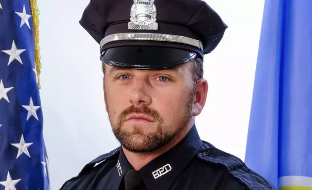 FILE - This undated photograph provided by the Boston Police Department shows Officer John O'Keefe of Canton, Mass. O'Keefe was found dead outside the home of a fellow officer in January 2022, and his girlfriend, Karen Read, has been charged with his death. Read's trial is scheduled to begin Monday, April 29, 2024. (Boston Police Department via AP, File)