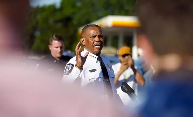 Charlotte-Mecklenburg Police Chief Johnny Jennings speaks at a press conference regarding an event where several officers on a task force trying to serve a warrant were shot in Charlotte, N.C., Monday, April 29, 2024. (AP Photo/Nell Redmond)