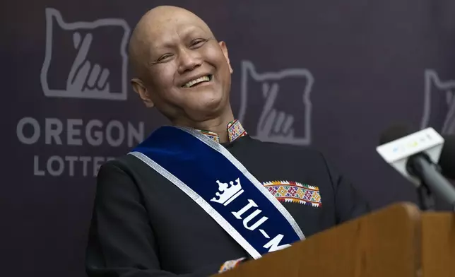 Cheng "Charlie" Saephan laughs while speaking during a press conference after it was revealed that he was one of the winners of the $1.3 billion Powerball jackpot at the Oregon Lottery headquarters on Monday, April 29, 2024, in Salem, Ore. (AP Photo/Jenny Kane)