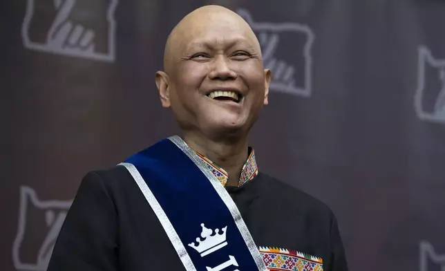 Cheng "Charlie" Saephan laughs during a press conference after it was revealed that he was one of the winners of the $1.3 billion Powerball jackpot at the Oregon Lottery headquarters on Monday, April 29, 2024, in Salem, Ore. (AP Photo/Jenny Kane)