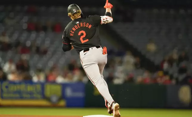 Baltimore Orioles' Gunnar Henderson runs the bases on a solo home run during the seventh inning of the team's baseball game against the Los Angeles Angels, Tuesday, April 23, 2024, in Anaheim, Calif. (AP Photo/Ryan Sun)
