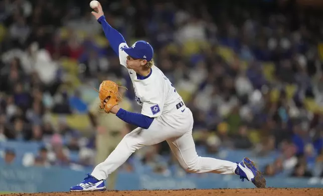 Los Angeles Dodgers pitcher Gavin Stone throws to a San Diego Padres batter during the third inning of a baseball game Saturday, April 13, 2024, in Los Angeles. (AP Photo/Marcio Jose Sanchez)