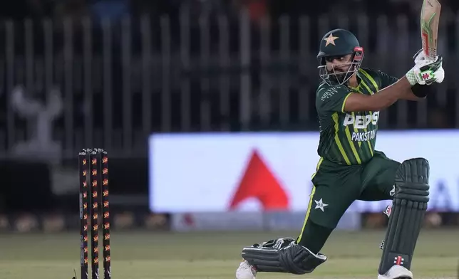 Pakistan's Babar Azam plays a shot during the second T20 international cricket match between Pakistan and New Zealand, in Rawalpindi, Pakistan, Saturday, April 20, 2024. (AP Photo/Anjum Naveed)