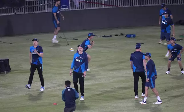 New Zealand's skipper Michael Bracewell, second left, and teammates attend a practice session in Rawalpindi, Pakistan, Tuesday, April 16, 2024. (AP Photo/Anjum Naveed)