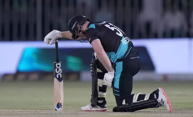 New Zealand's James Neesham reacts after his dismissal during the second T20 international cricket match between Pakistan and New Zealand, in Rawalpindi, Pakistan, Saturday, April 20, 2024. (AP Photo/Anjum Naveed)
