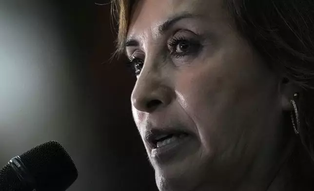 FILE - Peru's President Dina Boluarte talks to the press at the end of the Amazon Summit in Belem, Brazil, Aug. 8, 2023. Boluarte testified to prosecutors behind closed doors Friday, April 5, 2024, as authorities investigate whether she illegally received hundreds of thousands of dollars in cash, luxury watches and jewelry. (AP Photo/Eraldo Peres, File)