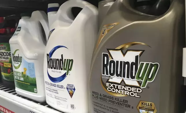 FILE - Containers of Roundup are displayed on a store shelf in San Francisco, Feb. 24, 2019. Thousands of legal claims against drug and chemicals company Bayer assert Roundup causes a cancer called non-Hodgkin’s lymphoma, which Bayer disputes. (AP Photo/Haven Daley, File)