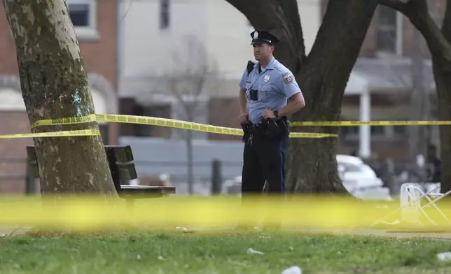 Police respond to a shooting at an Eid al-Fitr event, Wednesday, April 10, 2024, in Philadelphia. (Monica Herndon/The Philadelphia Inquirer via AP)