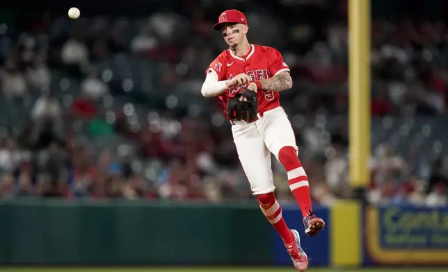 Los Angeles Angels shortstop Zach Neto throws out Philadelphia Phillies' Trea Turner at first during the seventh inning of a baseball game, Monday, April 29, 2024, in Anaheim, Calif. (AP Photo/Ryan Sun)