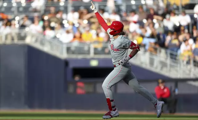Philadelphia Phillies' Alec Bohm runs the bases after hitting a two-run home run against the San Diego Padres during the first inning of a baseball game Saturday, April 27, 2024, in San Diego. (AP Photo/Brandon Sloter)