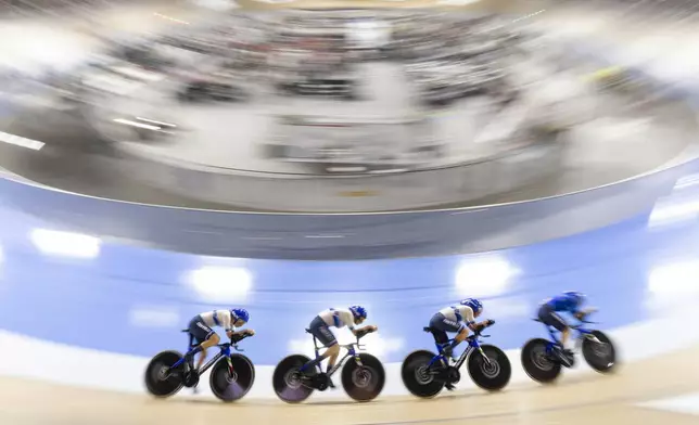 Elisa Balsamo, Chiara Consonni, Martina Fidanza and Vittoria Guazzini, of Italy, compete in the gold-medal round of the women's team pursuit during the UCI Track Nations Cup cycling event in Milton, Ontario, Friday, April 12, 2024. (Nick Iwanyshyn/The Canadian Press via AP)
