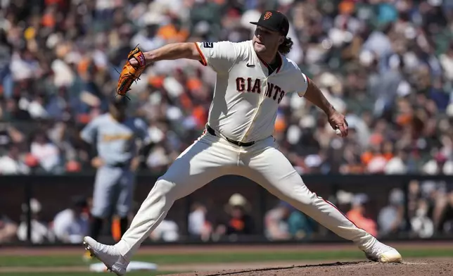 San Francisco Giants pitcher Erik Miller throws to a Pittsburgh Pirates batter during the seventh inning of a baseball game Sunday, April 28, 2024, in San Francisco. (AP Photo/Godofredo A. Vásquez)