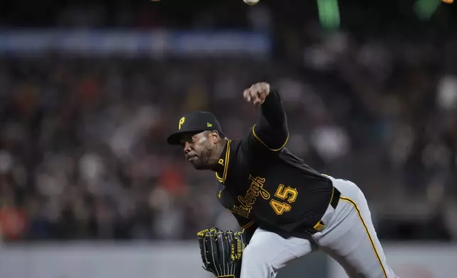 Pittsburgh Pirates pitcher Aroldis Chapman throws to a San Francisco Giants batter during the eighth inning of a baseball game Friday, April 26, 2024, in San Francisco. (AP Photo/Godofredo A. Vásquez)