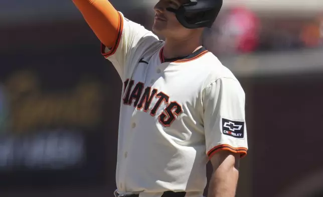 San Francisco Giants' Matt Chapman reacts after hitting a single against the Pittsburgh Pirates during the third inning of a baseball game Sunday, April 28, 2024, in San Francisco. (AP Photo/Godofredo A. Vásquez)