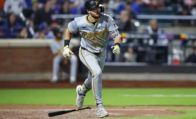 Pittsburgh Pirates' Jared Triolo runs after hitting a ball for a sacrifice fly against the New York Mets during the sixth inning of a baseball game, Monday, April 15, 2024, in New York. (AP Photo/Noah K. Murray)